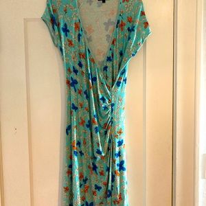King Louie brand- wrap dress w/butterflies on a blue/turquoise background.